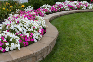 Stone retaining wall flower bed